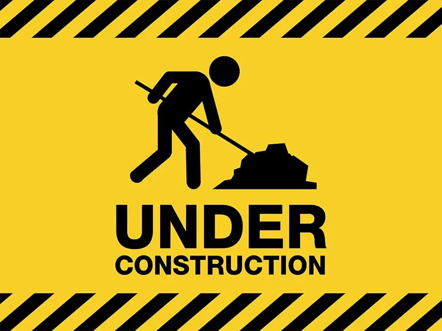 A work sign that says UNDER CONSTRUCTION